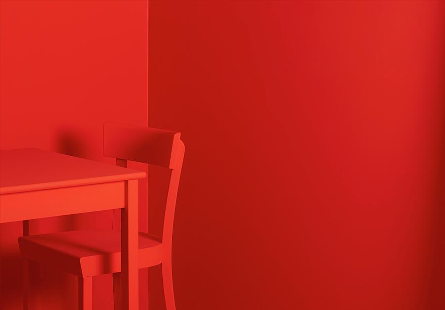 Red Table And Red Chair Against Red Wall Photograph by Roberto Rabe