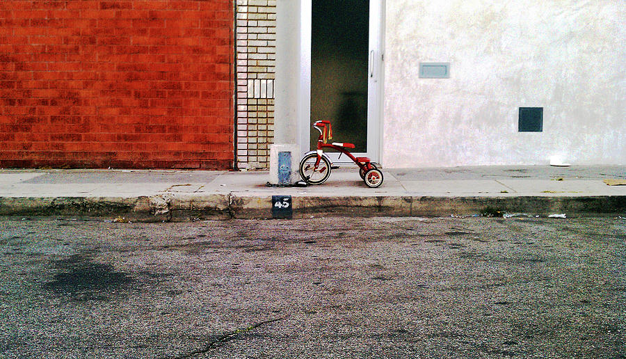 Red Tricycle On Sidewalk Photograph by Kevin Dean / Betaart