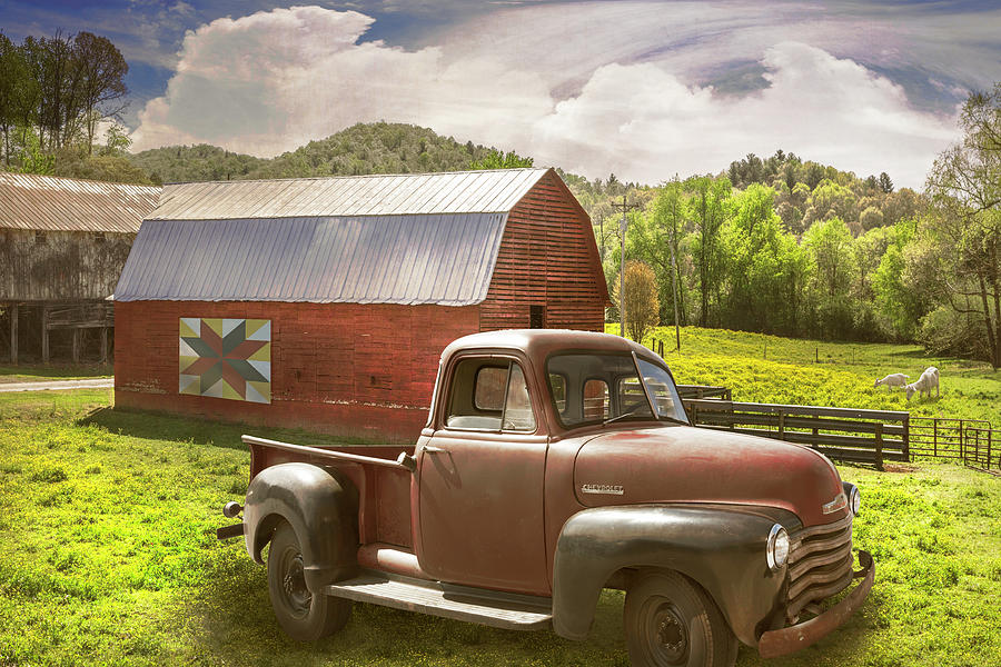 Red Truck at the Red Barn in Summer Light Photograph by Debra and Dave Vanderlaan