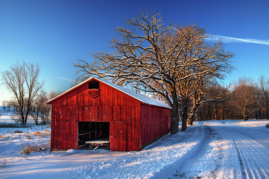 Red White and Blue - WI Tobacco barn on a frigid winter morning at sunrise Photograph by Peter Herman