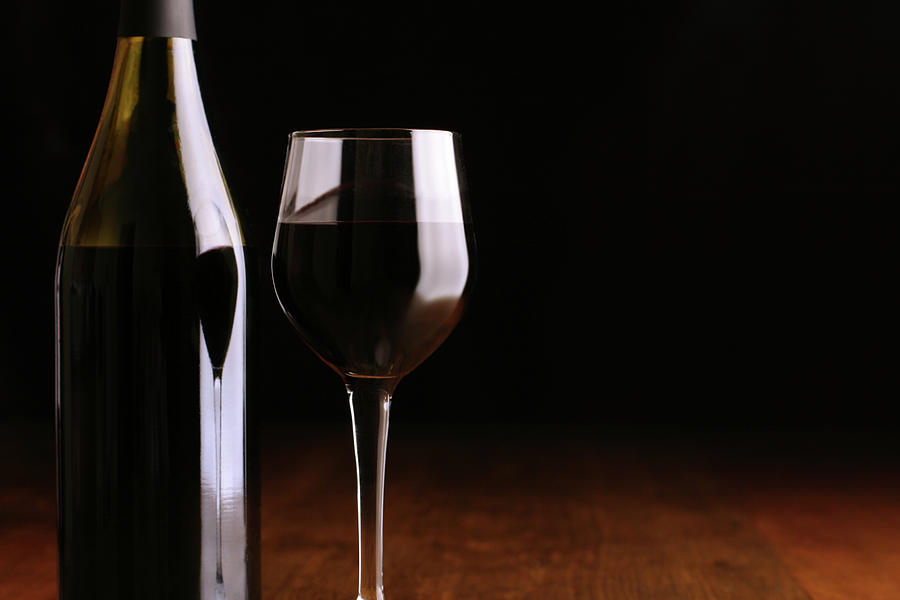 Dramatic Red Wine Splash Into Wine Glass by Donald gruener