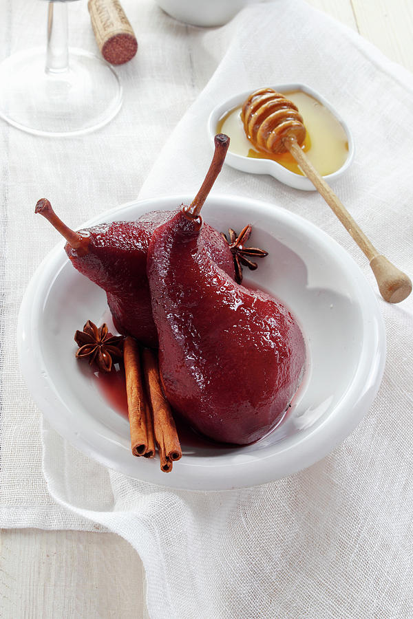 Red Wine Infused Pears With Cinnamon, Star Anise And Honey Photograph by Wawrzyniak.asia
