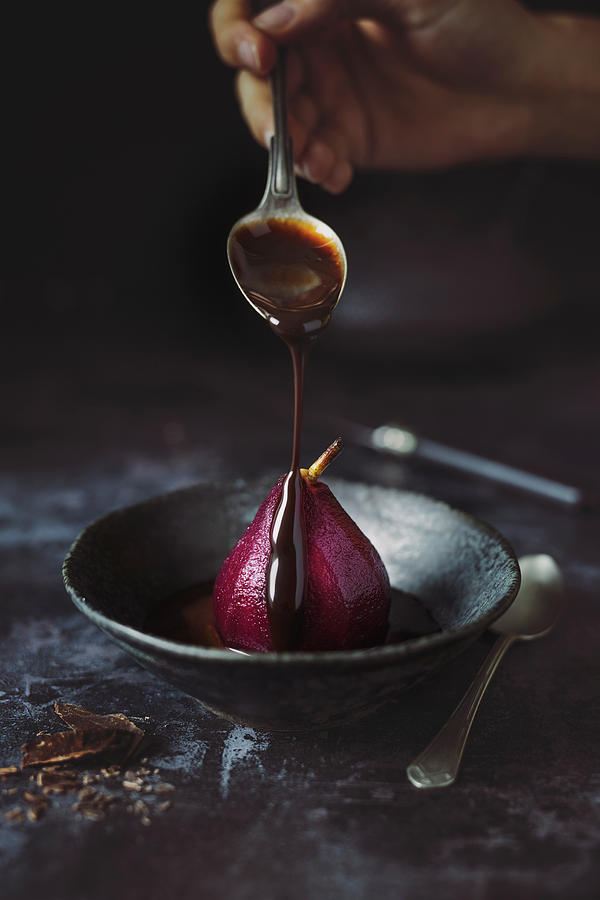 Red Wine Pear With Chocolate Sauce vegan Photograph by Jan Wischnewski