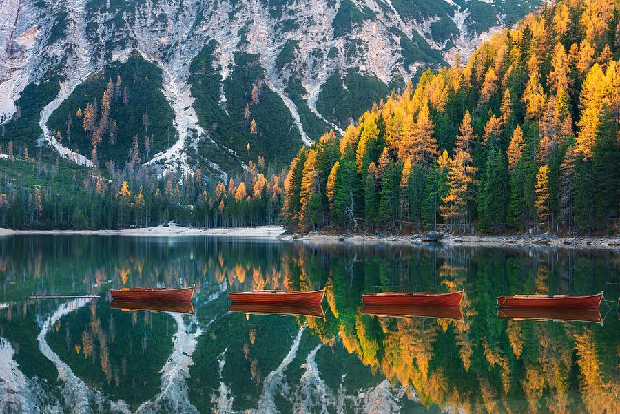 Red Wooden Boats On Braies Lake Photograph by Denys Bilytskyi - Fine ...