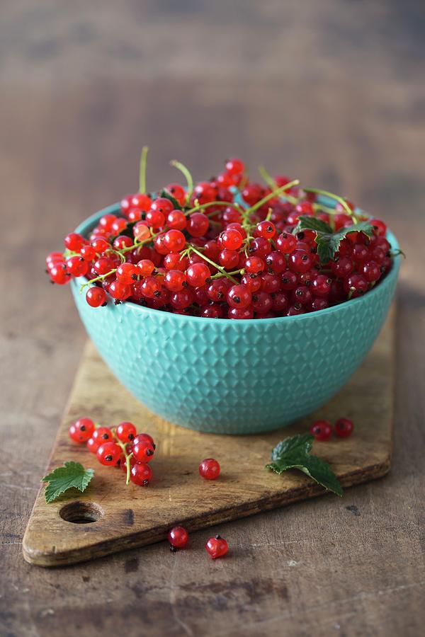Redcurrants In A Turquoise Bowl Photograph by Malgorzata Laniak