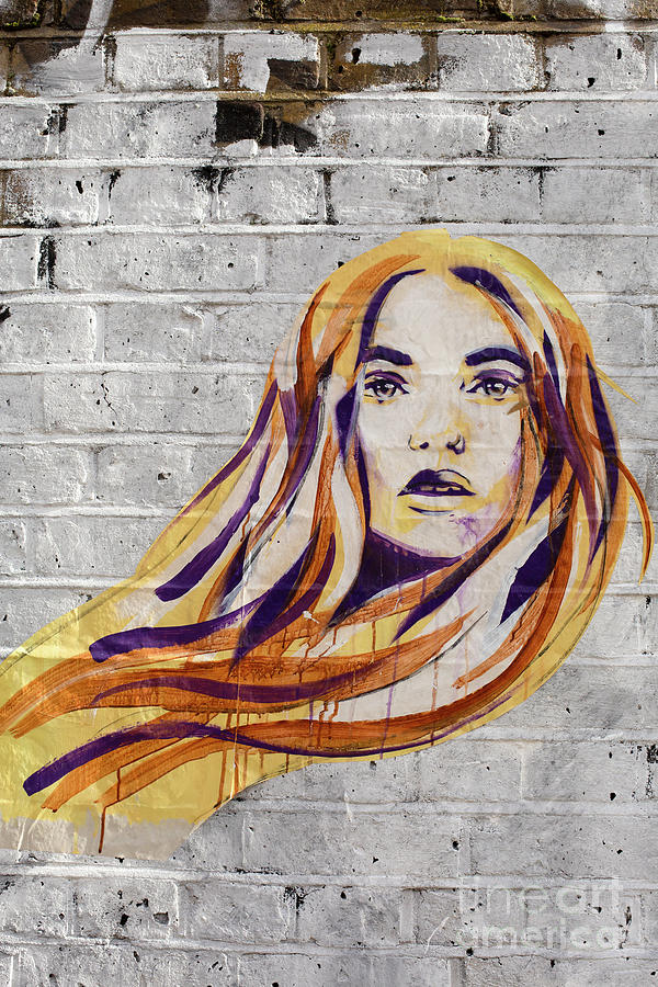 Redhaired girl spray painted on wall Photograph by Patricia Hofmeester