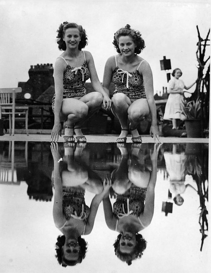 Reflected Twins Photograph by Fox Photos Reflected Twins Photograph by Fox Photos