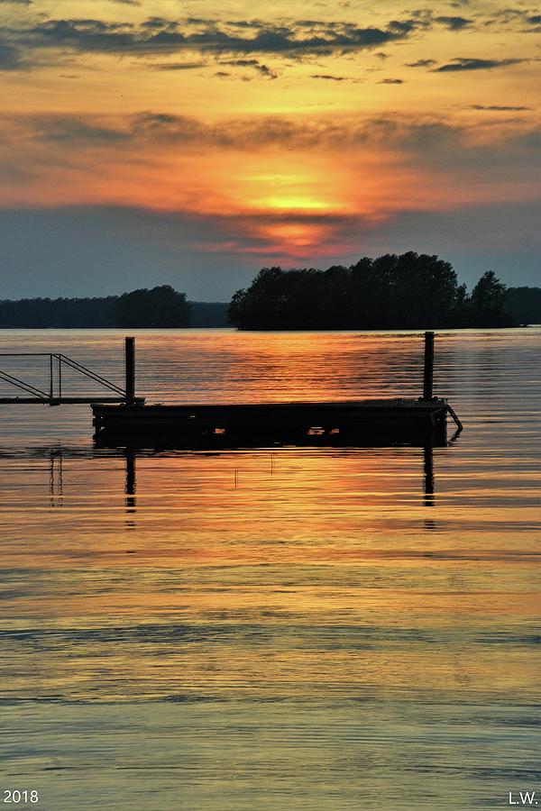 Reflecting Sunset On The Lake Vertical Photograph by Lisa Wooten