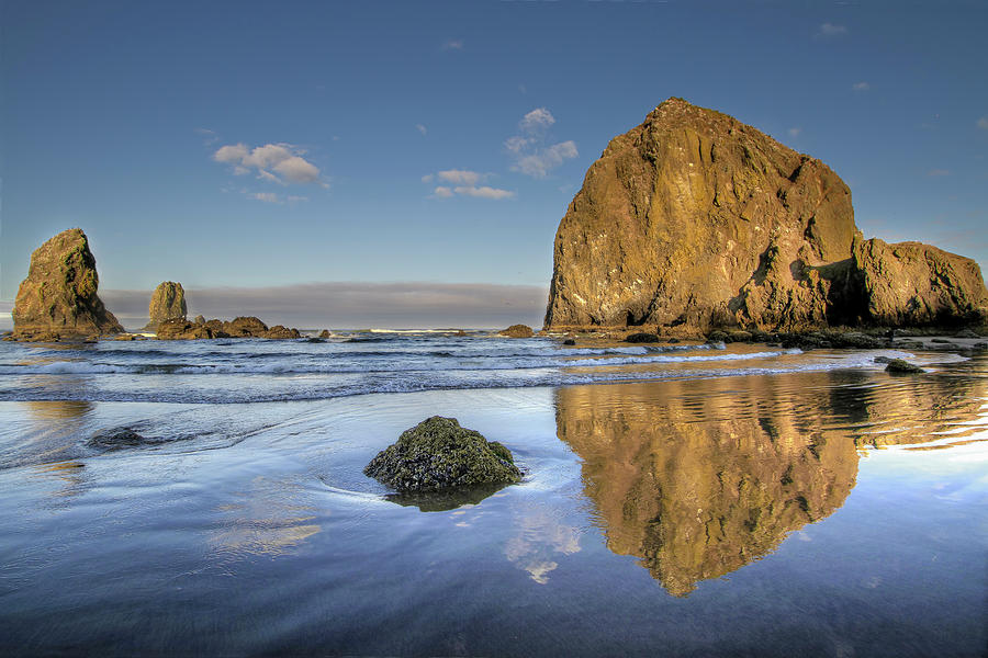 Reflection Of Haystack Rock At Cannon Photograph by David Gn Photography