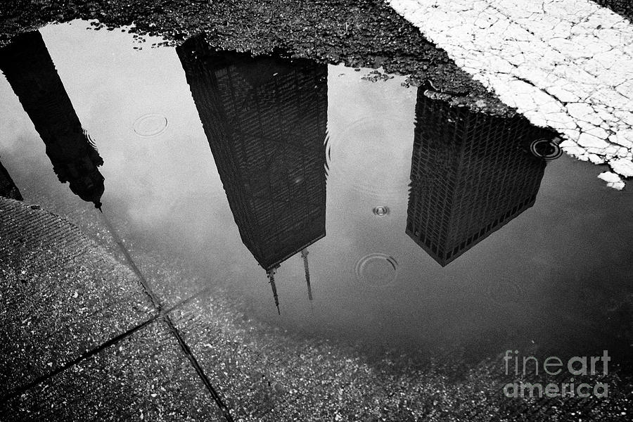 Reflection Of John Hancock Tower 875 North Michigan In Rainwater Puddle