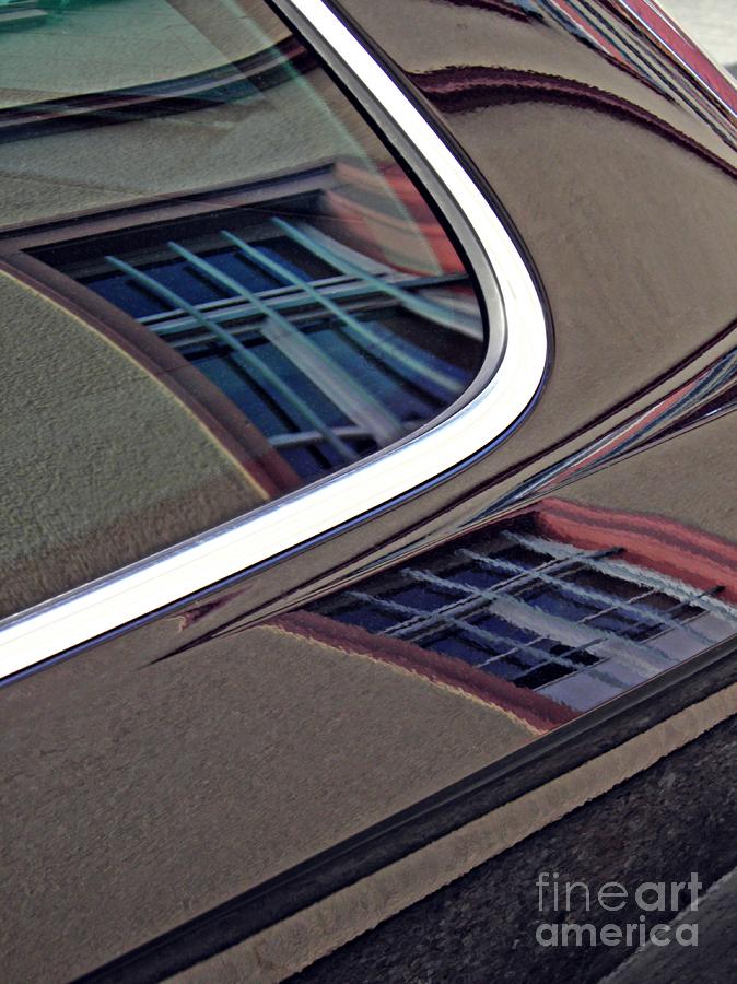 Reflection on a Parked Car 14 Photograph by Sarah Loft