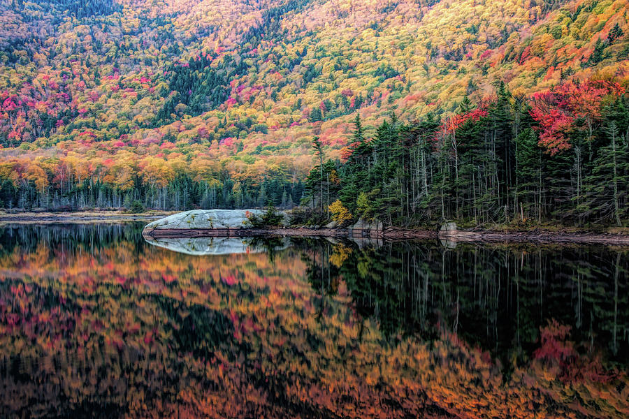 Reflection on Beaver pond of New Hampshire fall colors Photograph by Jeff Folger