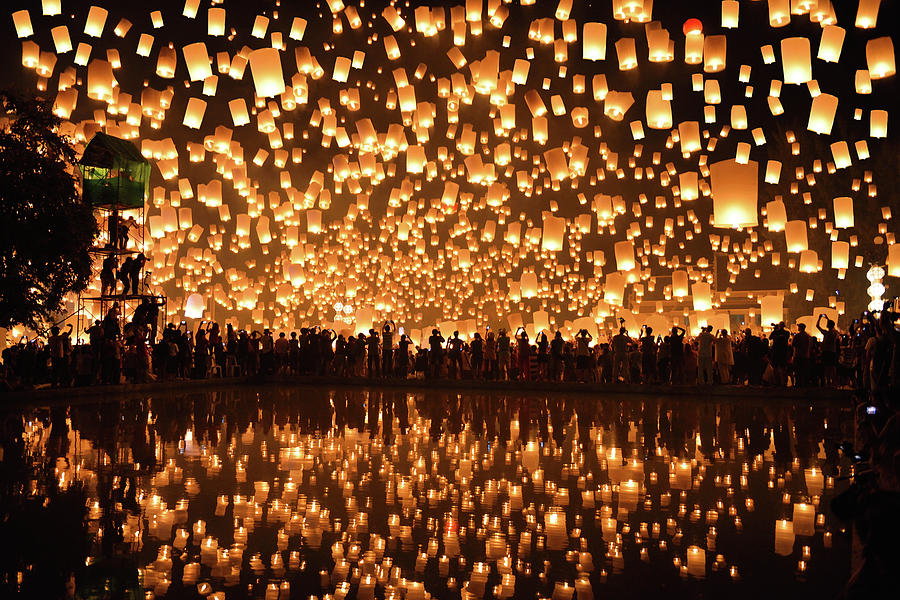 Reflection_floating Lanterns  Yi Peng Photograph by Nanut Bovorn