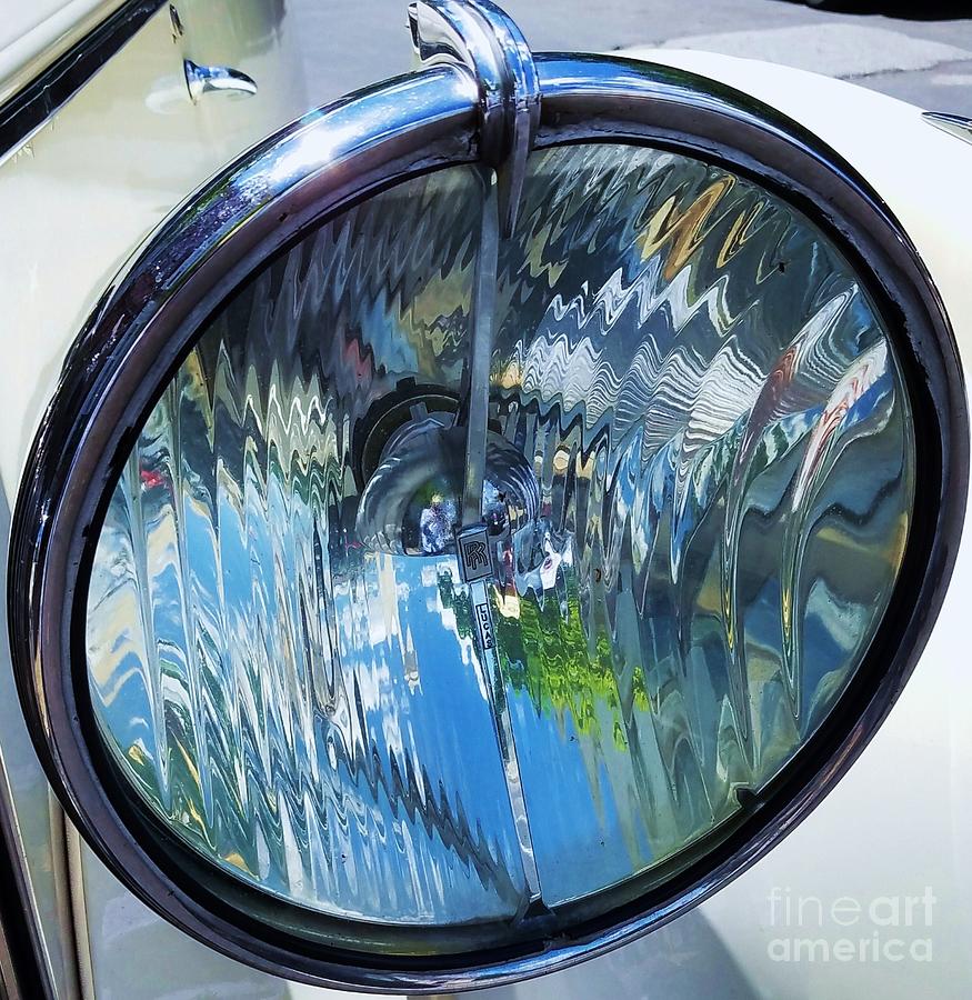Surreal Reflections In A 1955 Rolls Royce Headlamp Photograph by Poets Eye