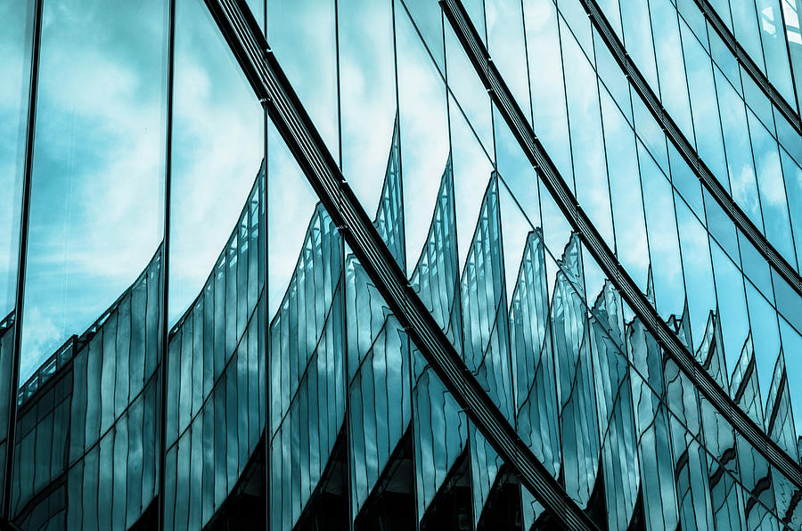 Reflections In A Modern Glass Facade Photograph by Ingo Jezierski