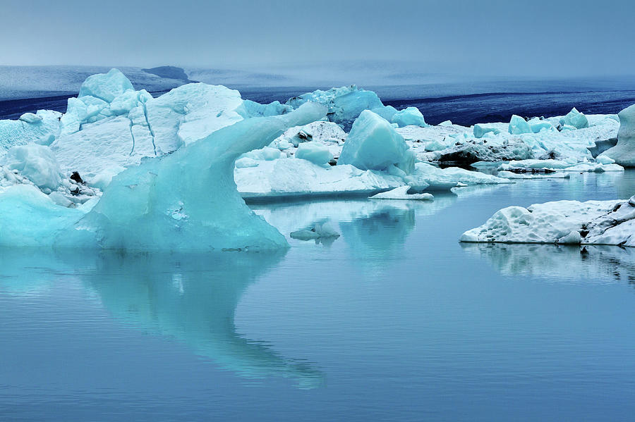 Reflections Of Icebergs At Photograph by Anna Gorin