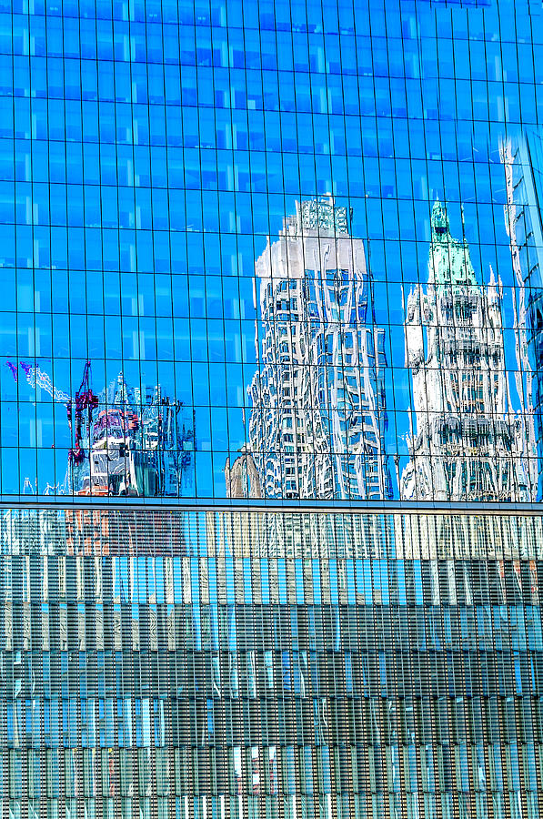 Reflections of lower Manhattan Photograph by Xavier Cardell