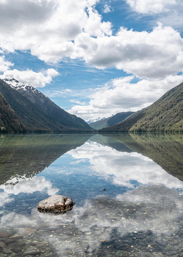 Mountain And Clouds Reflections On The Mirror Surface Of Lake Gunn In New Zealand Photograph by Peter Kolejak