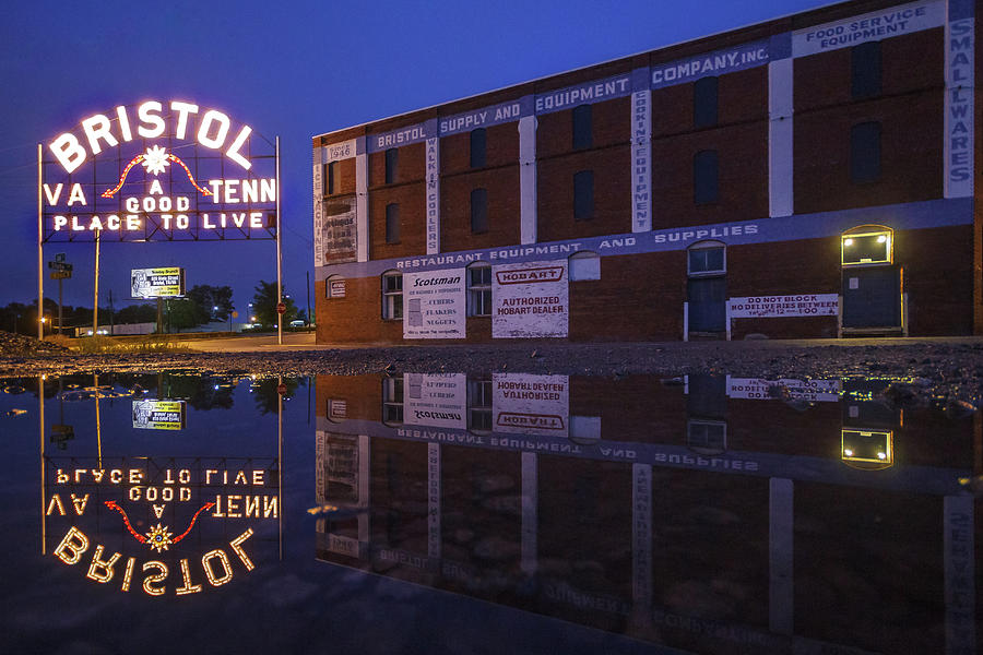 Reflections Of The Bristol Sign And Interstate Hardware Building Photograph