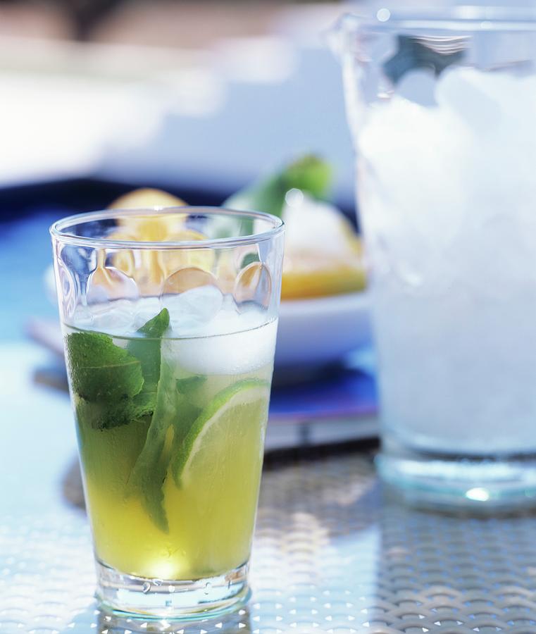 Refreshing Drink With Lime And Mint Photograph by Matteo Manduzio