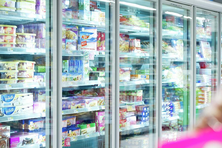 Refrigerated Shelves In A Supermarket Photograph by Rita Newman