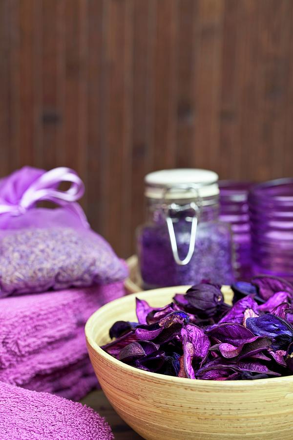 Relaxation And Well-being - Violet Flowers In Bamboo Dish, Bath Salts And Lavender Bag In Background Photograph by Uwe Merkel