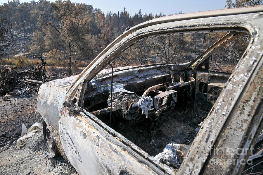 Remains Of A Burnt Car Photograph by Photostock-israel/science Photo Library