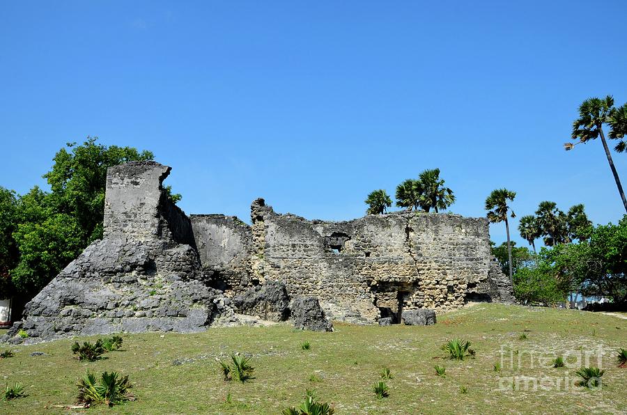 Remains of old Portuguese fort walls by seashore on Delft island Jaffna Sri Lanka Photograph by Imran Ahmed