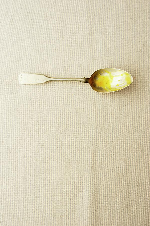 Remains Of Sauce On A Spoon Photograph by Michael Wissing