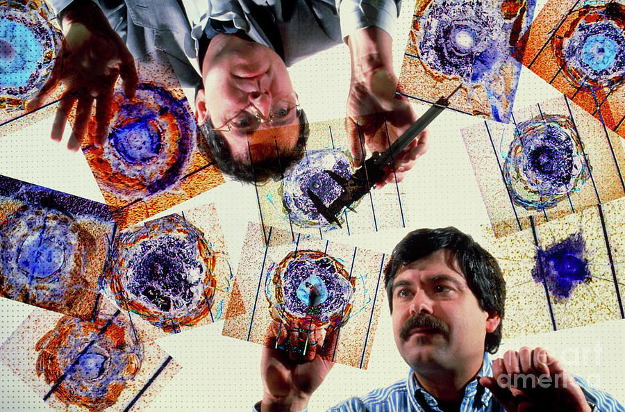 Researchers Examine Impact Crater Micrographs Photograph by Geoff Tompkinson/science Photo Library