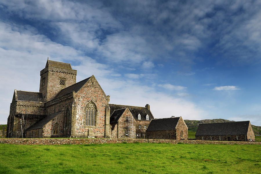 Restoration work at Iona Abbey monastery founded by St Columba b Photograph by Reimar Gaertner