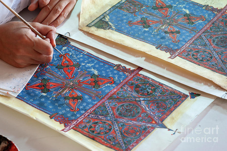 Restorer Working On 15th Century Illustrations Photograph by Marco Ansaloni / Science Photo Library
