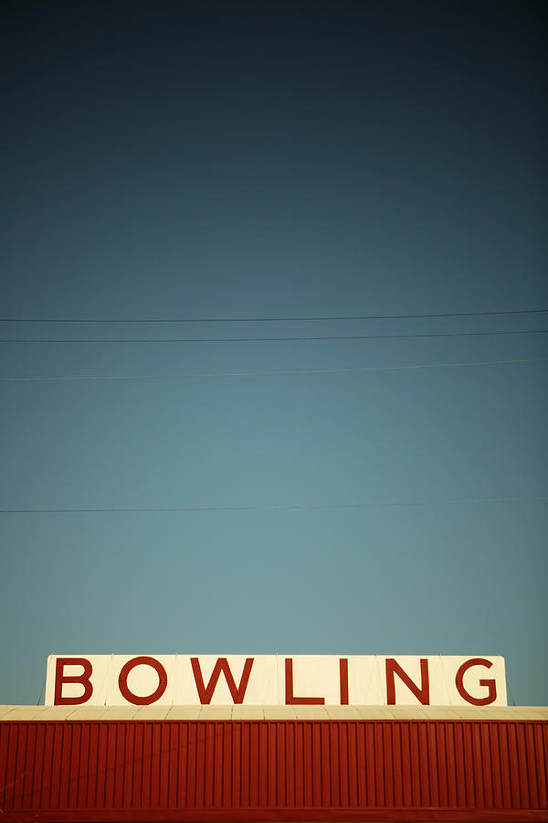 Retro Bowling Sign On A Roof Photograph by Kevinruss