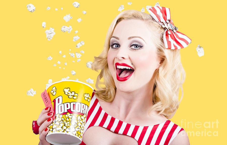Retro girl taking popcorn to cinema Photograph by Jorgo Photography