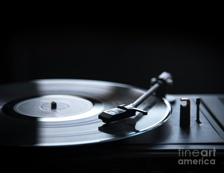Retro gramophone vinyl player over black background with copyspa Photograph by Jelena Jovanovic