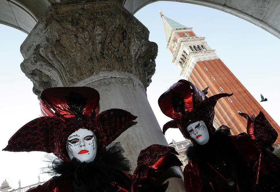 Revellers Pose in St. Marks Square Photograph by Alessandro Bianchi ...