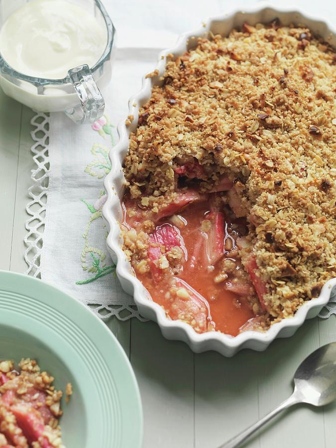 Rhubarb Crumble With Nuts And Oats Photograph by Jonathan Gregson