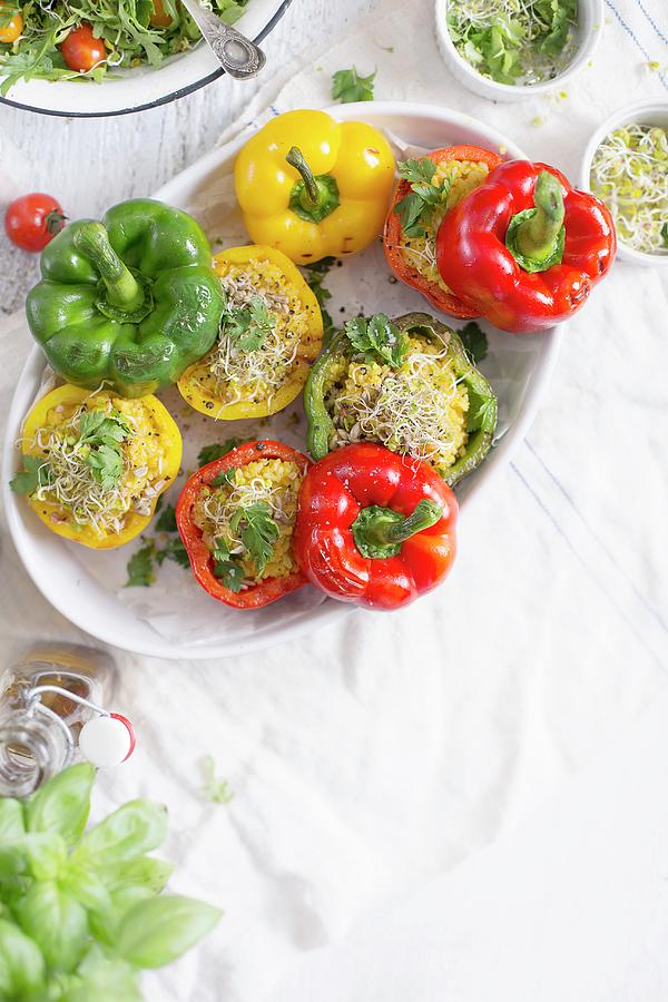 Rice And Pumpkin Stuffed Peppers Baked In A White Dish Photograph by Natalia Mantur