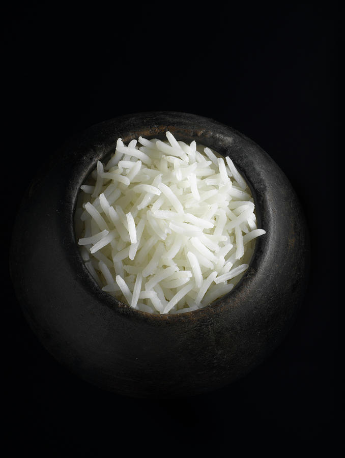 Rice In A Wooden Bowl, From Above Photograph by Howard Bjornson
