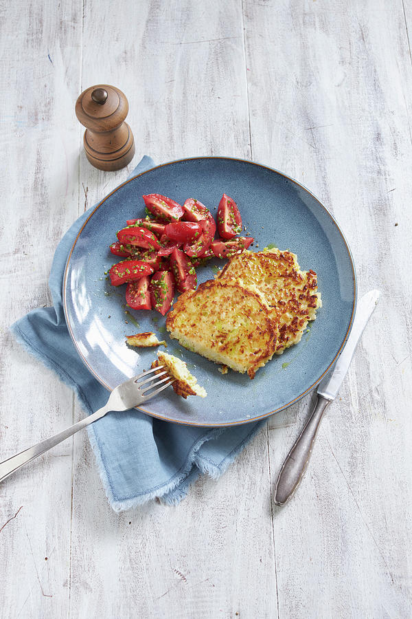 Rice Pancakes With Tomato Salad Photograph by Oliver Stockfood Studios / Brachat