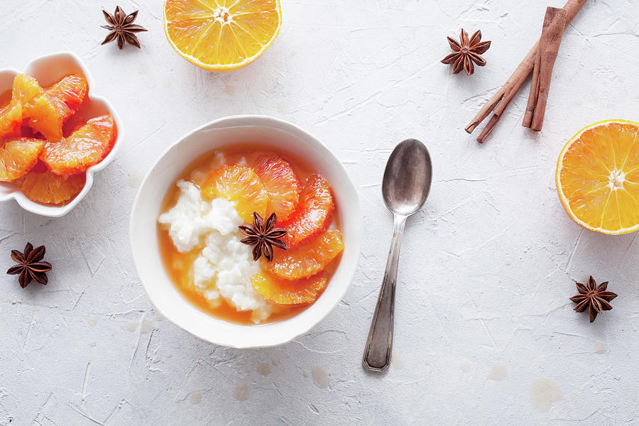Rice Porridge With Blood Oranges Marinated In Cinnamon And Star Anice Photograph by Kati Finell