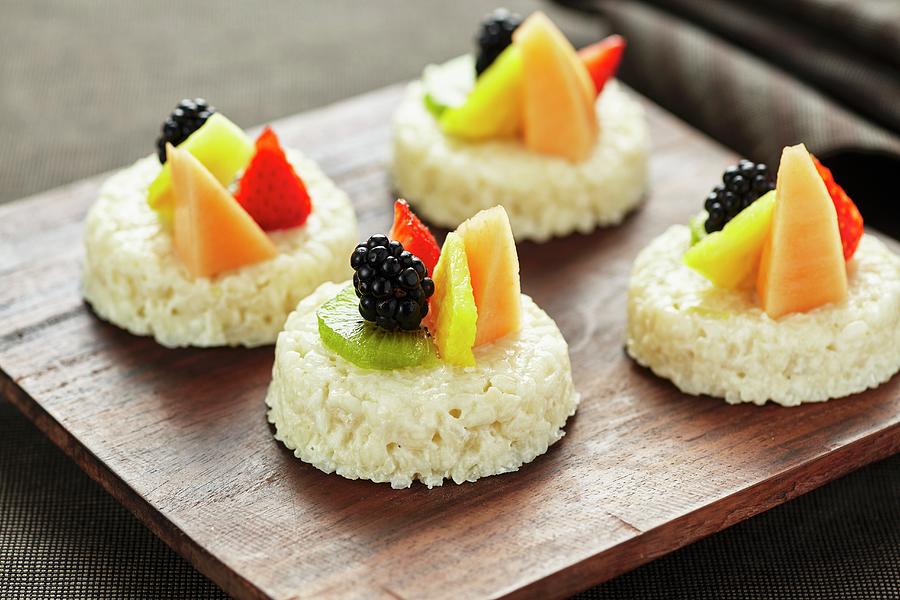 Rice Pudding Tartlets With Fruit Photograph by Herbert Lehmann