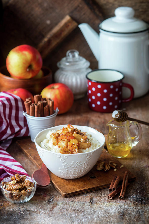 Rice Pudding With Apples, Cinnamon And Nuts Photograph by Irina Meliukh