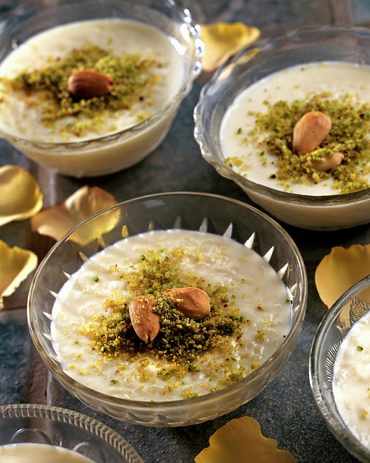 Rice Pudding With Pistachios And Almonds Photograph by Franco Pizzochero