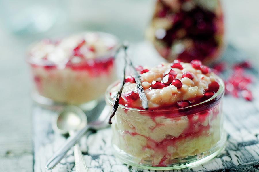 Rice Pudding With Pomegranate Seeds And Grenadine Syrup Photograph by Tomasz Jakusz