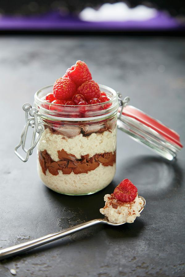 Rice Pudding With Raspberries And Chocolate Photograph by Rafael Pranschke