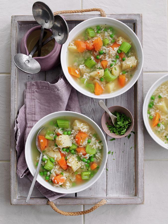 Rice Soup With Diced Vegetables Photograph by Gareth Morgans