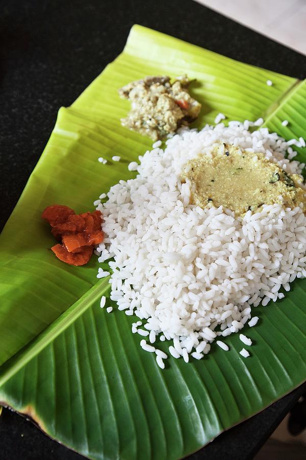 Rice With Dahl And Chutney On A Banana Leaf india Photograph by Laura Rizzi