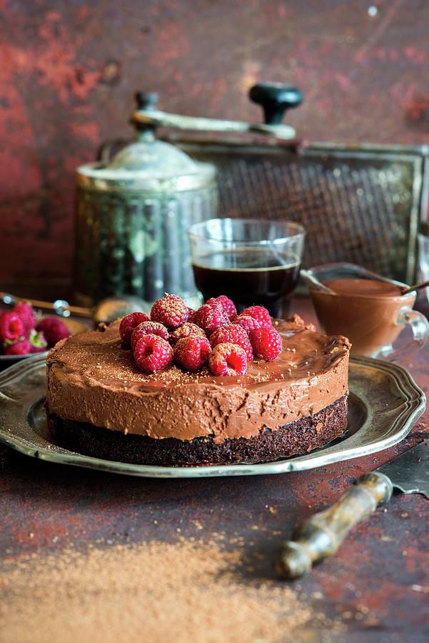 Rich Raspberry Chocolate Mousse Cake With Moist Chocolate Sponge, Decorated With Cocoa Powder Photograph by Irina Meliukh