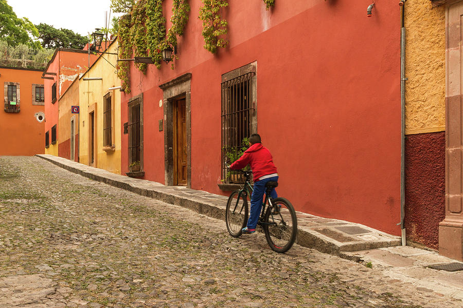 Riding a Bike in San Miguel Photograph by Lindley Johnson